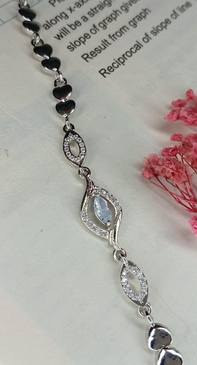 Elegant Sterling Silver Aquamarine and CZ Heart Bracelet