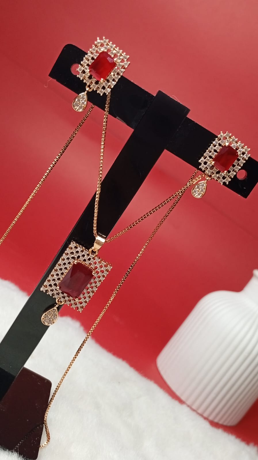 the gold-tone red stone jewelry set