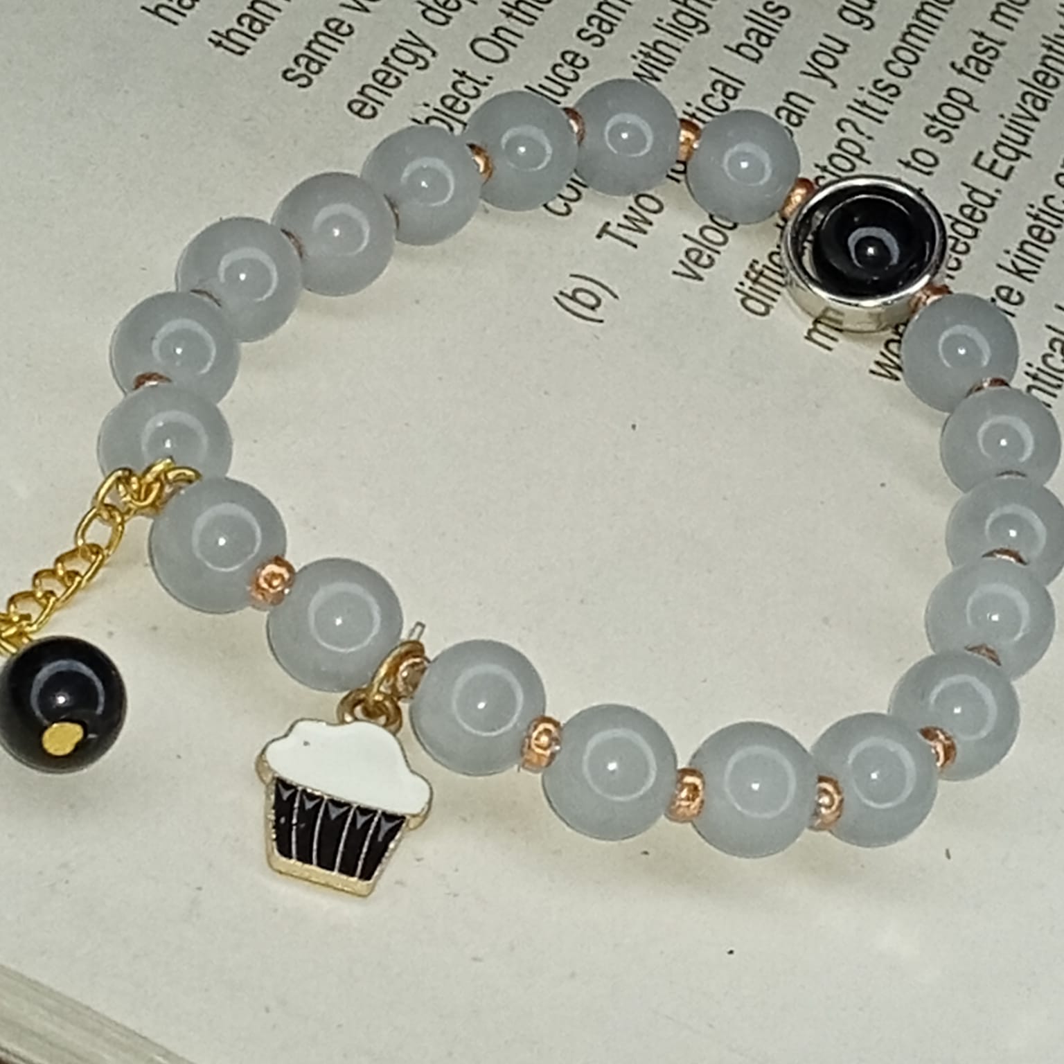 Sweet Indulgence: Serene Grey & Cupcake Charm Bracelet