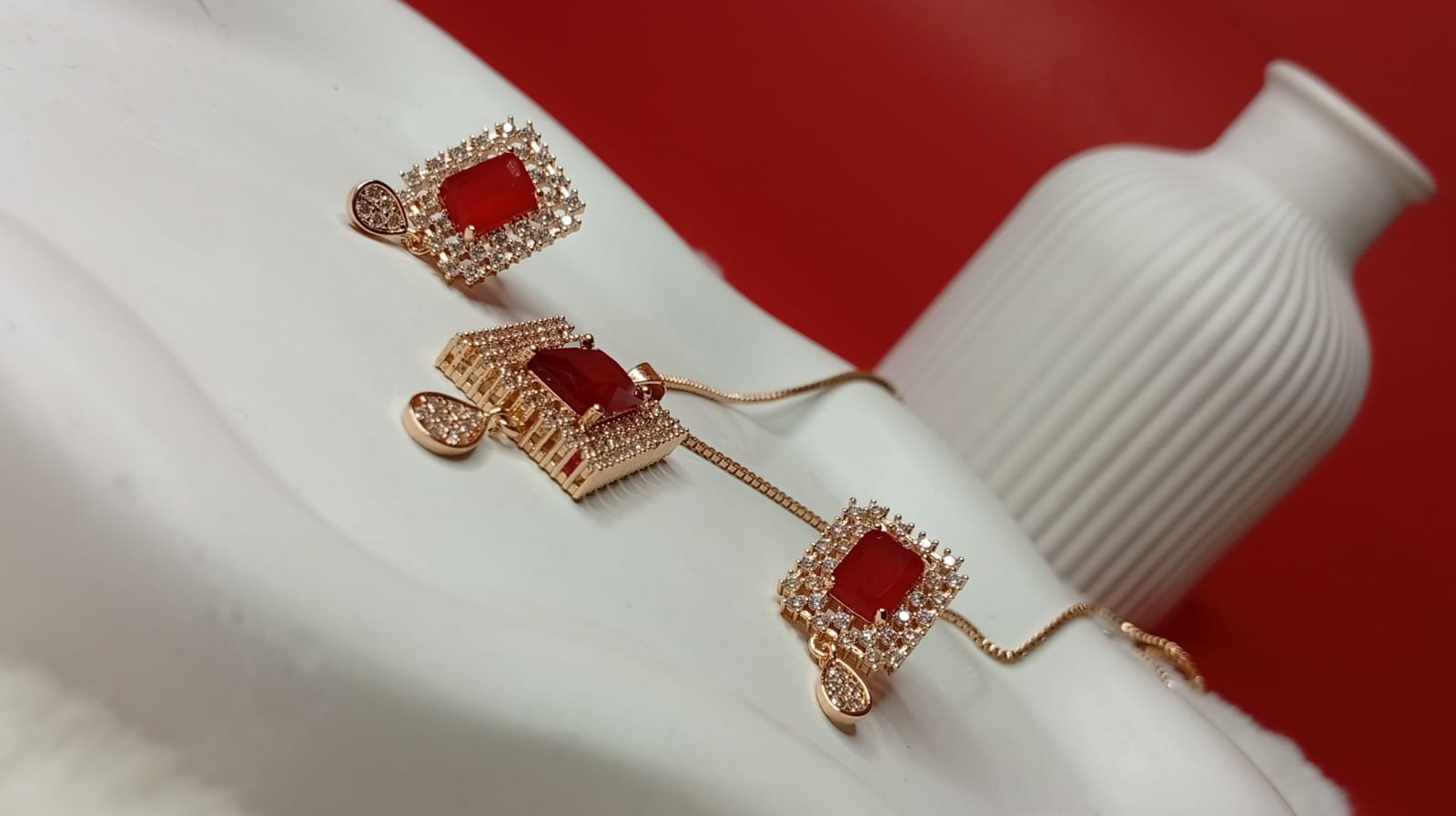 the gold-tone red stone jewelry set