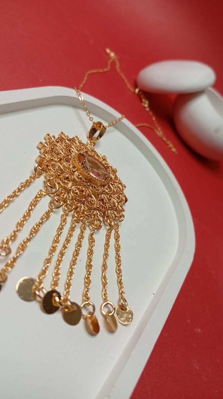 the gold-tone multi-chain coin necklace