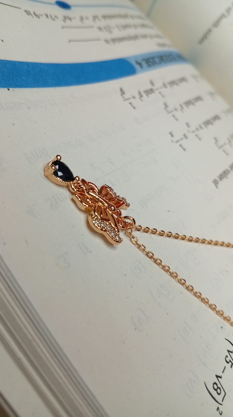 gold-plated double-layer butterfly necklace featuring crystal  stones.