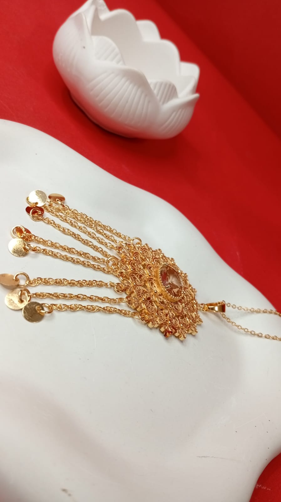 the gold-tone multi-chain coin necklace