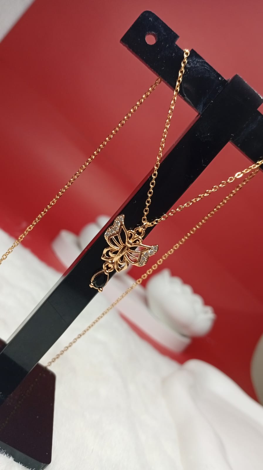 gold-plated double-layer butterfly necklace featuring crystal  stones.